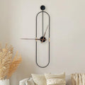 DRELIFAM Large Black Oval Wall Clock with Walnut Pointers - Modern Home Decor