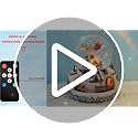 Musical Christmas Village Snow Globe with Santa & Reindeer—48 Carols, Remote