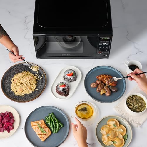 Farberware 0.7 Cu Ft Countertop Microwave Oven - 700W, Auto Cook, Defrost, Child Lock - Black