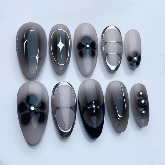 24Pcs Black Press on Nails Medium Almond Fake Nails Black Flower with Silver Star Full Cover Glue on Nails Reusable Acrylic Star False Nails Glossy Stick on Nails for Women Girls Manicure Salon Kits