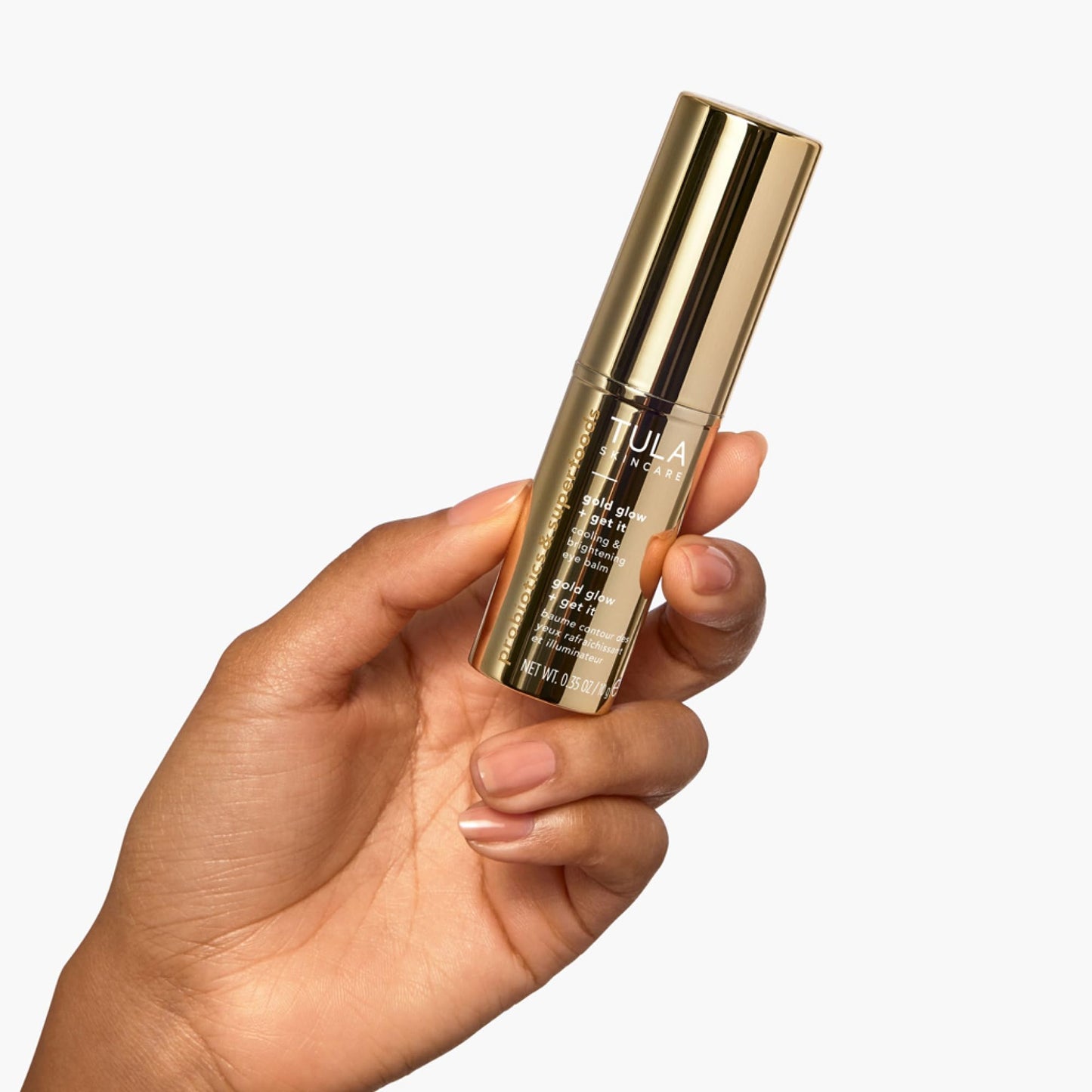 TULA Skin Care Eye Balm Gold Glow - Dark Circle Treatment, Instantly Hydrate and Brighten Undereye Area, Portable and Perfect to Use On-the-go, 0.35 oz.